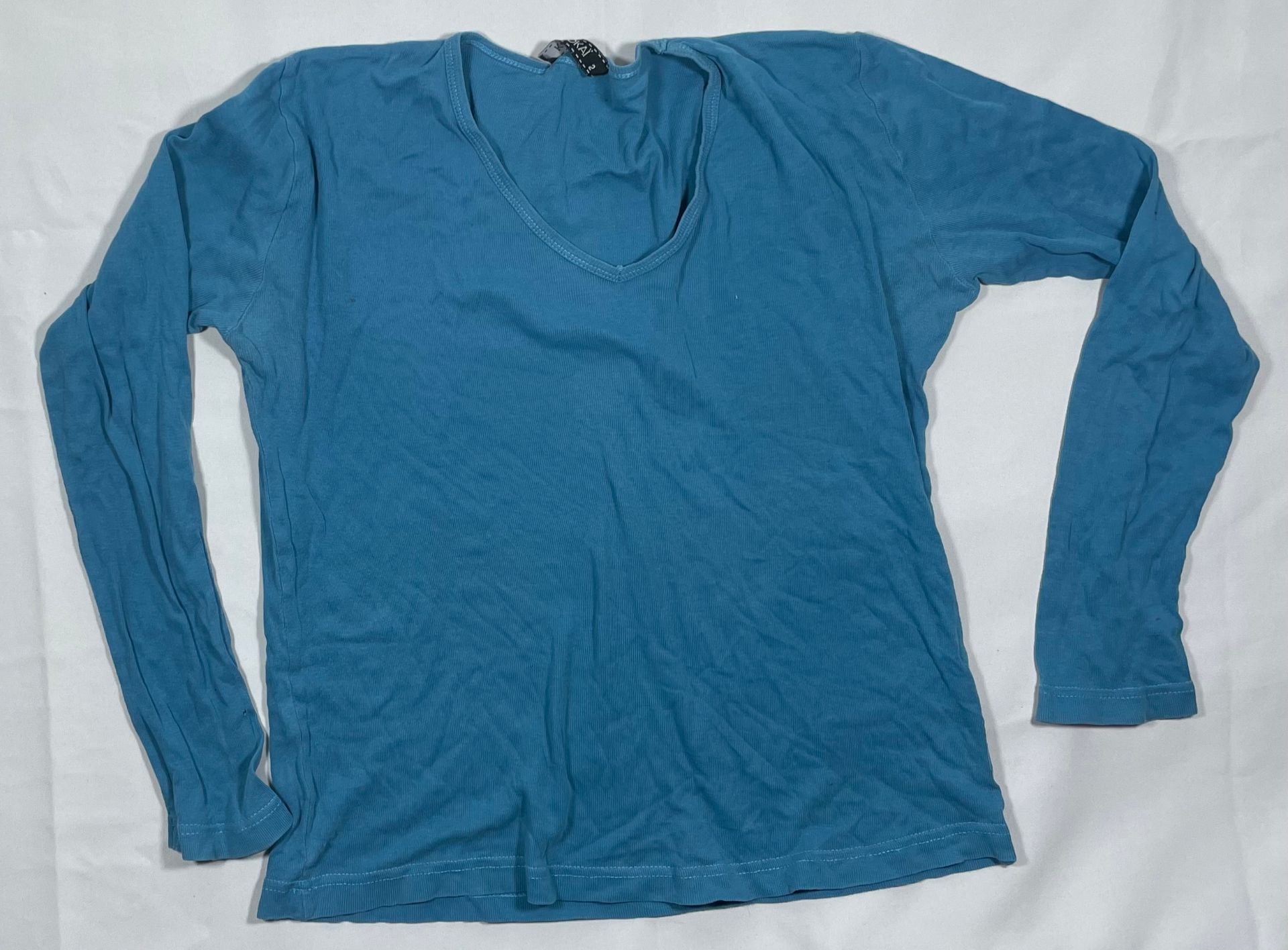 1 Polera a mangas largas