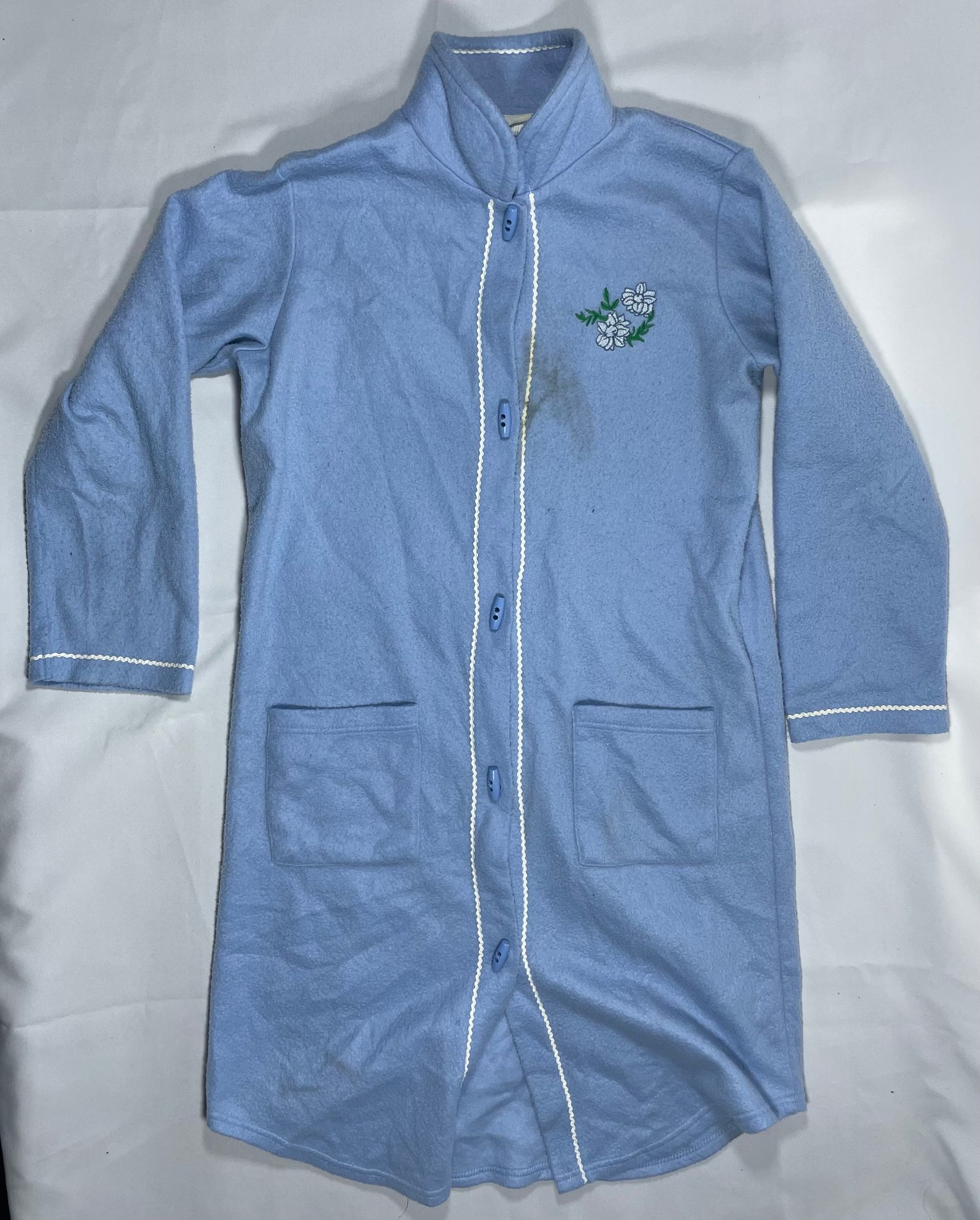 5 Poleras y una Bata