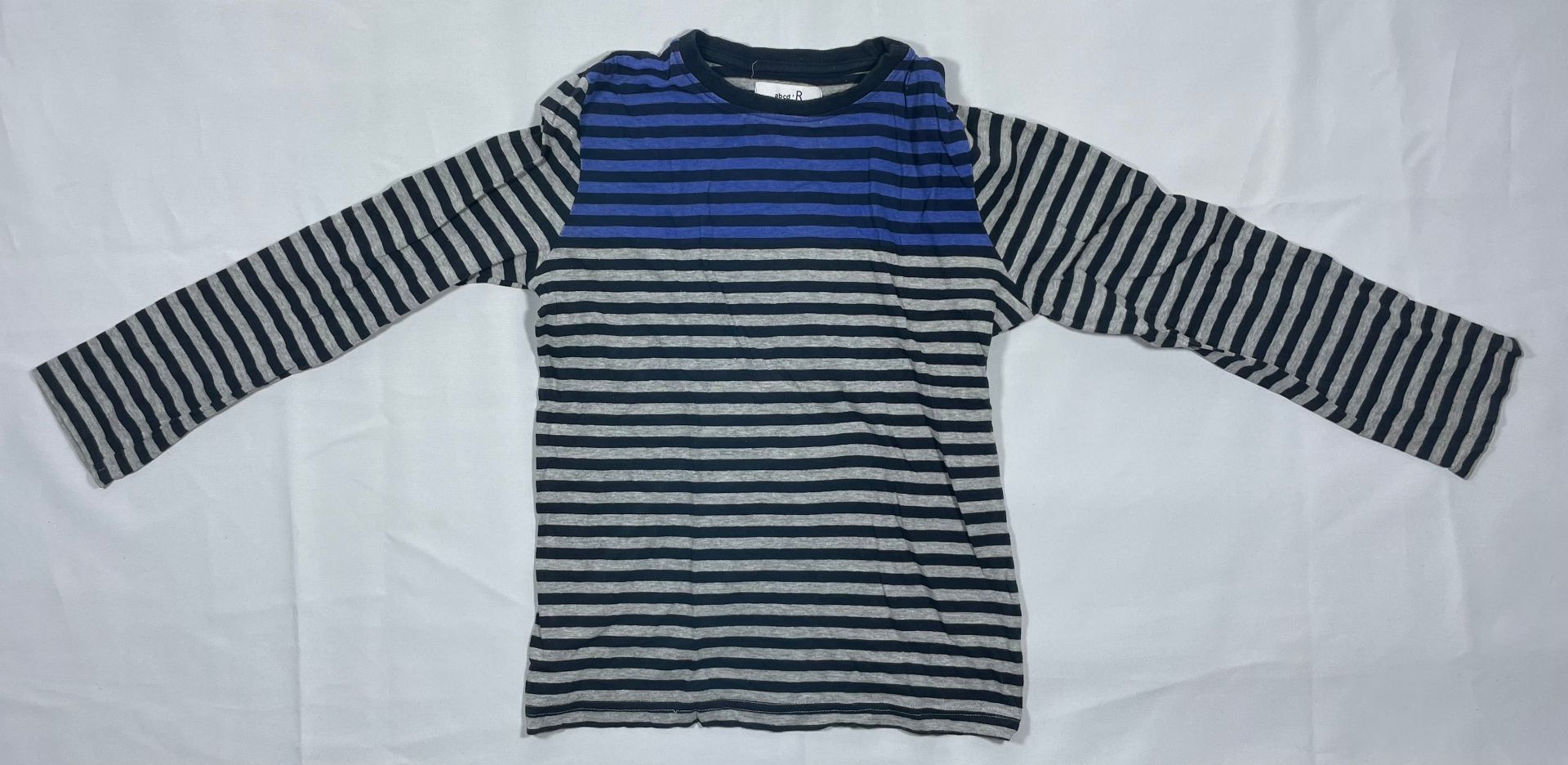 1 Polo de 8 años y una polera de 10 años